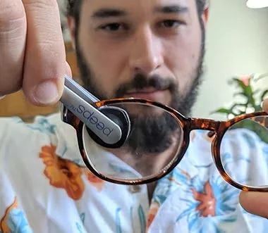 Before and after lens clarity with Peeps glasses cleaner
